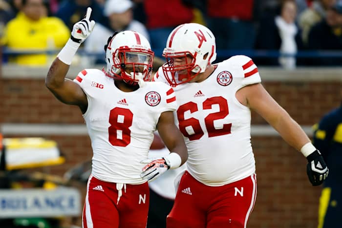 Ameer Abdullah and Cole Pensick 2013 Nebraska at Michigan football USATSI_7542612